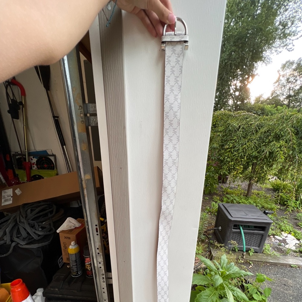 White Michael Kors belt never wore